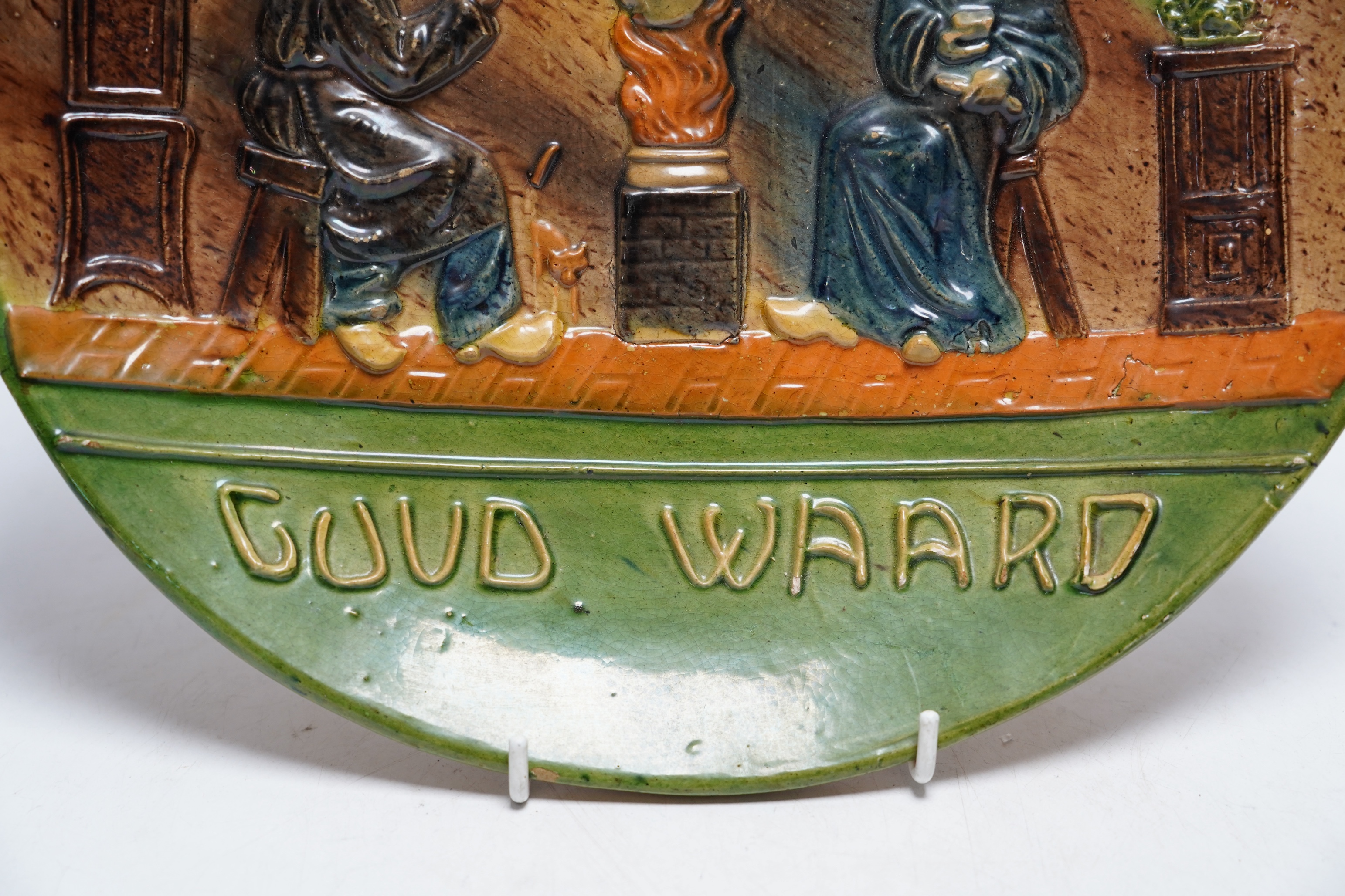 A Dutch pottery proverb plate, circa 1900, 31cm